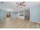 Spacious living area showcases an open layout, connecting the kitchen, dining, and living spaces at 413 E Henderson Es St, East Spencer, NC 28144