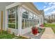 Bright sunroom with large windows offers natural light and outdoor views to the property at 413 E Henderson Es St, East Spencer, NC 28144