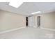 Basement area with tile floors and doorways to other rooms at 431 Sullivan Rd, Statesville, NC 28677