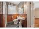Vintage bathroom with pedestal sink, unique wallpaper and walk-in shower at 431 Sullivan Rd, Statesville, NC 28677