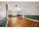 Spacious room with hardwood floors, natural light, and decorative trim at 431 Sullivan Rd, Statesville, NC 28677