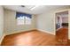 Well-lit bedroom features unique wallpaper and trim, offering ample space at 431 Sullivan Rd, Statesville, NC 28677