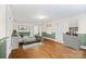 This staged bedroom features a full sized bed, hardwood floors and a large window at 431 Sullivan Rd, Statesville, NC 28677