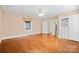 Spacious bedroom features hardwood floors, a ceiling fan, and ample closet space at 431 Sullivan Rd, Statesville, NC 28677