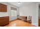 Eat-in kitchen featuring wood cabinets, hardwood floors, and natural light at 431 Sullivan Rd, Statesville, NC 28677