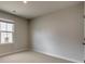 Cozy bedroom featuring plush carpet, natural light, and a serene atmosphere at 4503 Hunton Dale Nw Rd, Concord, NC 28027