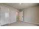 Cozy bedroom featuring neutral tones, carpet flooring, white trim, and a closet for ample storage at 4503 Hunton Dale Nw Rd, Concord, NC 28027
