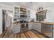 Modern kitchen featuring stainless steel appliances, butcher block countertops, and white subway tile at 511 Plymouth Ave, Salisbury, NC 28144