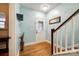 Welcoming entryway with hardwood floors, stairs to the upper level, and decorative details at 5664 Norwood Ridge Dr, Rock Hill, SC 29732