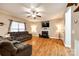Bright and spacious living room with hardwood floors, fireplace, and plenty of room for entertaining at 5664 Norwood Ridge Dr, Rock Hill, SC 29732