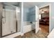 Bathroom featuring a shower, a bathtub, and access to the Primary bedroom at 5664 Norwood Ridge Dr, Rock Hill, SC 29732