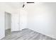 Bedroom with a ceiling fan and closet at 603 Mt. Wesley Church Rd, Hiddenite, NC 28636
