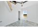 Bedroom with a ceiling fan, window, and an open closet door at 603 Mt. Wesley Church Rd, Hiddenite, NC 28636