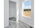 Bedroom with a window and an open closet door at 603 Mt. Wesley Church Rd, Hiddenite, NC 28636