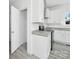 Bright white kitchen with pantry, stainless steel appliances and granite countertops at 603 Mt. Wesley Church Rd, Hiddenite, NC 28636