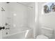 Bathroom featuring a tub-shower combo, natural light, and a toilet at 605 Arrow Point Ln, Davidson, NC 28036