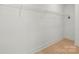 Walk-in closet with shelving and a wooden floor at 605 Arrow Point Ln, Davidson, NC 28036