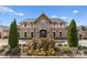 Luxury building with stone and siding, showcasing manicured landscaping at 6422 Chimney Bluff Rd, Lancaster, SC 29720