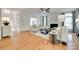Open-concept living space featuring hardwood floors, stylish furnishings, and an inviting atmosphere at 6804 Riesman Ln, Charlotte, NC 28210