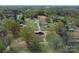 A beautiful aerial view displays the farm, including the home, pool, and barn at 7514 Secrest Shortcut Rd, Indian Trail, NC 28079