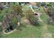 Aerial view showcasing acreage surrounded by large trees at 7514 Secrest Shortcut Rd, Indian Trail, NC 28079