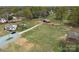 Expansive aerial view showing the home, barn, paddocks and surrounding land at 7514 Secrest Shortcut Rd, Indian Trail, NC 28079