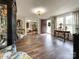 Bright living room with a view of the front door, showing hardwood floors and stylish decor at 7514 Secrest Shortcut Rd, Indian Trail, NC 28079