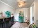 Charming sitting room with stylish decor, featuring a decorative rug and whimsical flamingo accents at 7514 Secrest Shortcut Rd, Indian Trail, NC 28079