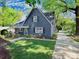 Lovely home featuring mature trees, a side driveway and lush, green lawn at 848 Woodland Rd, Statesville, NC 28677