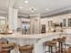 Spacious kitchen featuring a large island with seating, stainless steel appliances, and custom cabinetry at 8912 Heydon Hall Cir, Charlotte, NC 28210