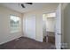 Bedroom featuring neutral carpet and ample closet space at 907 Bethpage Rd, Kannapolis, NC 28081