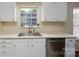 Bright kitchen with ample counter space, white cabinets, and stainless-steel dishwasher at 907 Bethpage Rd, Kannapolis, NC 28081