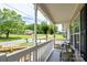 Cozy front porch with seating, offering a relaxing outdoor space with neighborhood views at 907 Bethpage Rd, Kannapolis, NC 28081