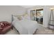 Bright bedroom with deck access, showcasing seamless indoor-outdoor living and a tranquil retreat at 925 Lanier Ln, Monroe, NC 28110