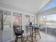 Bright dining area with shutters and a lake view at 925 Lanier Ln, Monroe, NC 28110
