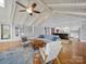 Bright and airy living room connected to the kitchen, featuring hardwood floors, vaulted ceilings, and comfortable seating at 925 Lanier Ln, Monroe, NC 28110