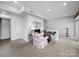 Spacious living area with neutral tones, offering a versatile space for relaxation and entertainment at 925 Lanier Ln, Monroe, NC 28110