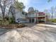 Spacious backyard featuring a two-level deck, perfect for outdoor entertaining with lake views at 925 Lanier Ln, Monroe, NC 28110