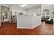 Modern kitchen with white cabinetry and stainless steel appliances, open to the Gathering room at 10107 Atkins Ridge Dr, Charlotte, NC 28213
