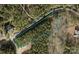 Aerial view of a wooded home lot for sale, outlining the property lines along a quiet street at 105 Southern Horizon Dr, Statesville, NC 28677