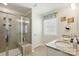 Bathroom featuring a glass enclosed shower, granite counters and tile flooring at 1066 Chicory Trce, Lake Wylie, SC 29710