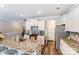 Spacious kitchen featuring a central island, stainless steel appliances, and abundant cabinet space at 1066 Chicory Trce, Lake Wylie, SC 29710