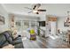 Bright living room with multiple windows and stylish furnishings at 1066 Chicory Trce, Lake Wylie, SC 29710