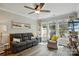 Cozy living room featuring a comfortable sofa, natural light, and tasteful decor at 1066 Chicory Trce, Lake Wylie, SC 29710