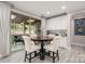 Breakfast nook featuring backyard views and adjacent butlers pantry at 10823 Preservation Park Dr, Charlotte, NC 28214