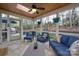 Inviting screened porch with outdoor seating overlooking the landscaped backyard at 10823 Preservation Park Dr, Charlotte, NC 28214