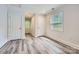 Bright bedroom with wood-look floors, natural light, and neutral paint at 119 Taylor Ct, Mooresville, NC 28117