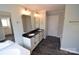 Elegant bathroom featuring a double vanity, soaking tub, and modern fixtures at 121 Silver Fox Ct, Mount Holly, NC 28120