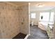 Beautiful bathroom features a walk-in shower and soaking tub with natural light at 121 Silver Fox Ct, Mount Holly, NC 28120