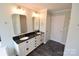 Stylish bathroom featuring a double vanity, modern fixtures, and clean finishes at 121 Silver Fox Ct, Mount Holly, NC 28120